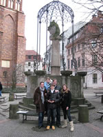 This is a foto from a private guided tour given by the guide Hilmar H. Werner for Humboldt Tours Berlin. It was about the history and presence of Berlin. Here you see us in the quarter of St. Niclas (Nikolai-Viertel) in front of the church of St. Niclas (Nikolai-Kirche) with the Bear of Berlin on its column.